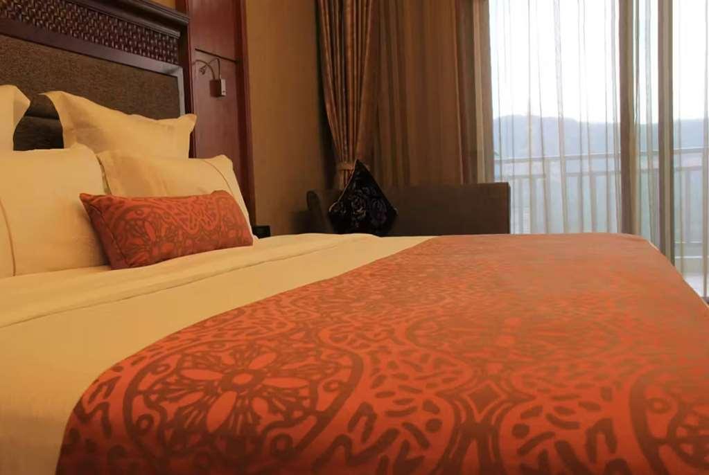 Ramada Plaza Xishuangbanna Hotell Rum bild